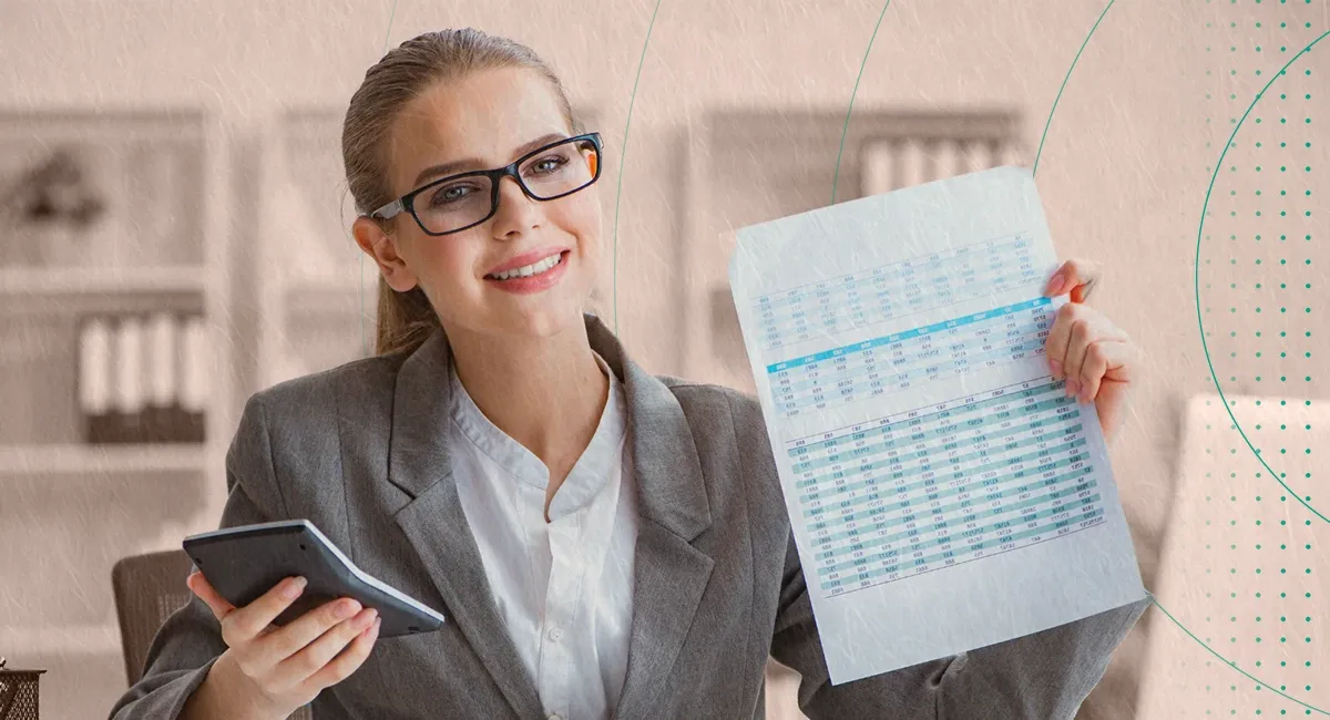 Person reviewing financial documents for outsourced accounting services.